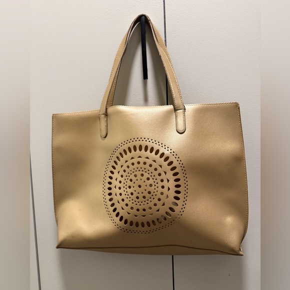 Neiman Marcus Handbags - Neiman Marcus Gold Tote with Cut-Out Design